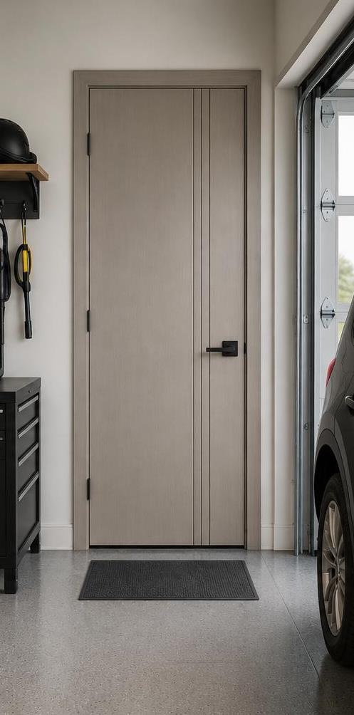 Grey flush interior door to a garage