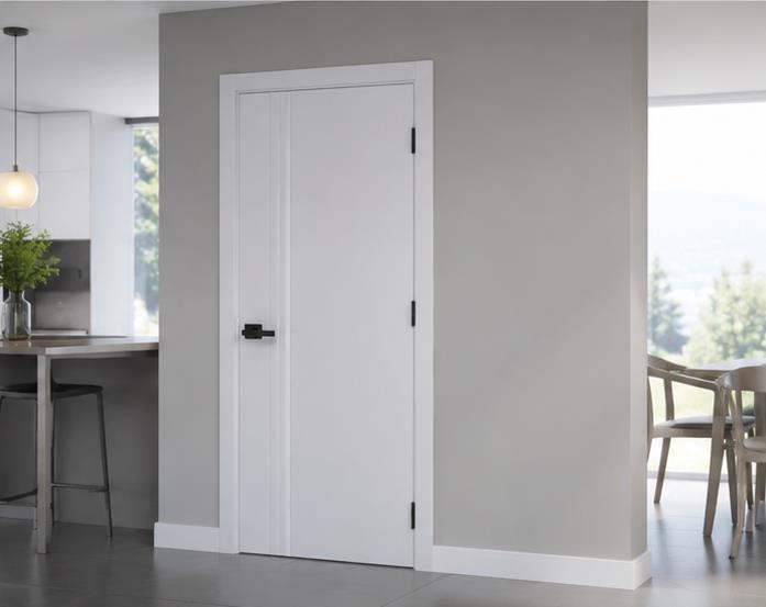 White flush interior door beside a kitchen